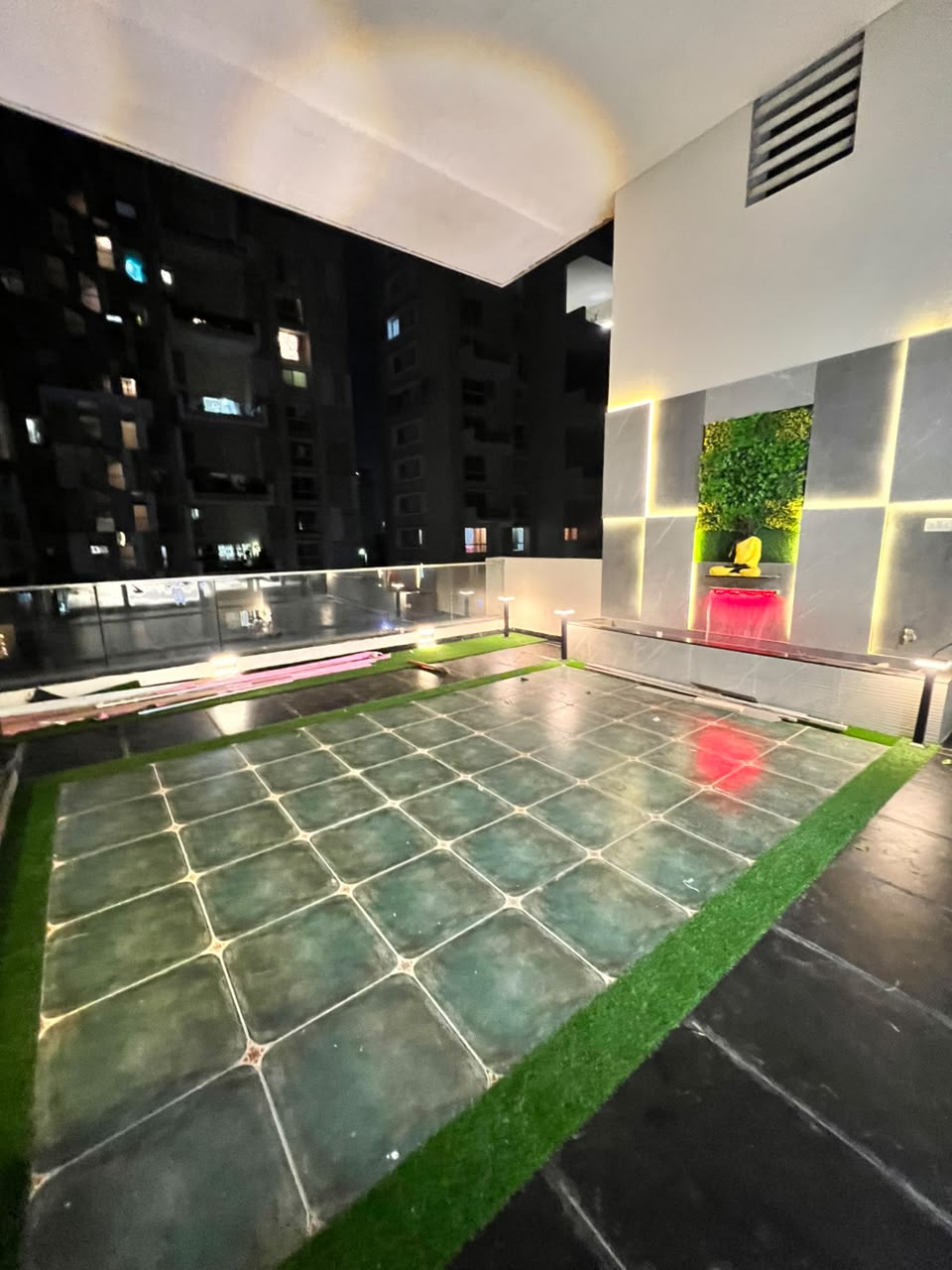 Rooftop terrace garden with Buddha water feature