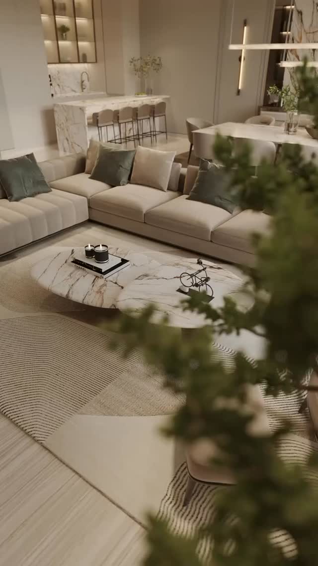 Living room with marble coffee table and sage cushions