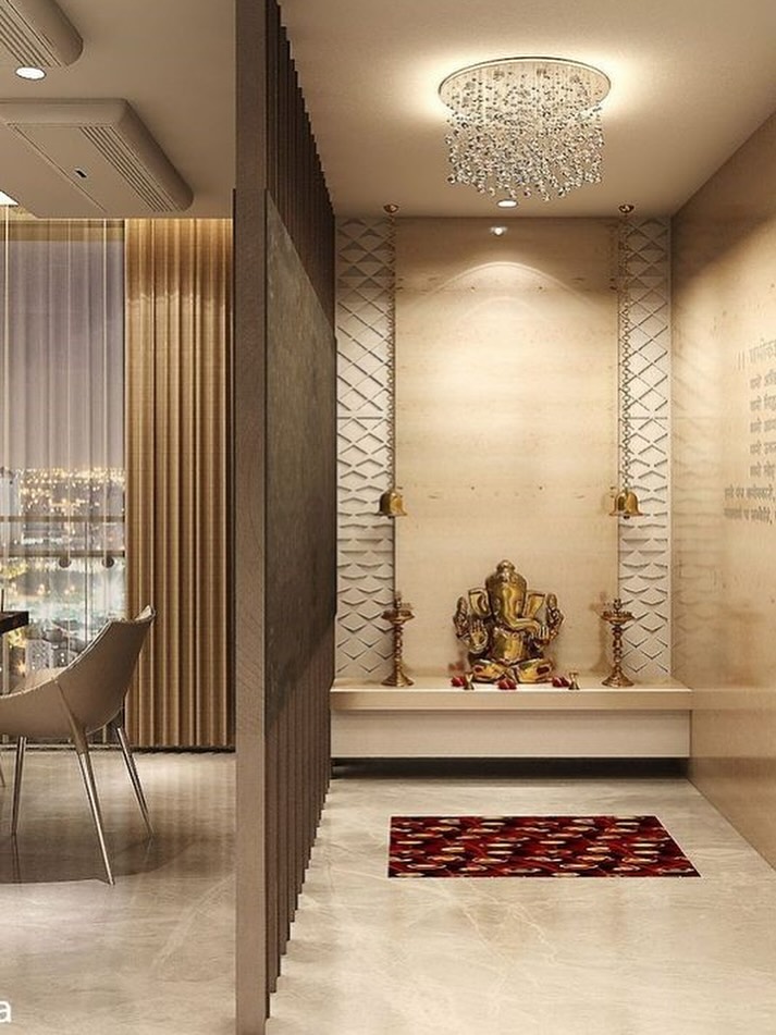 Pooja room with golden Ganesha idol and jaali panelling