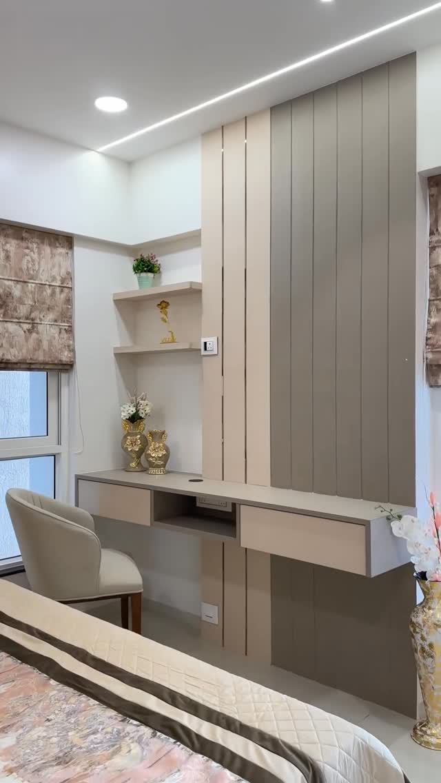 Bedroom with built-in vanity and decorative panelling
